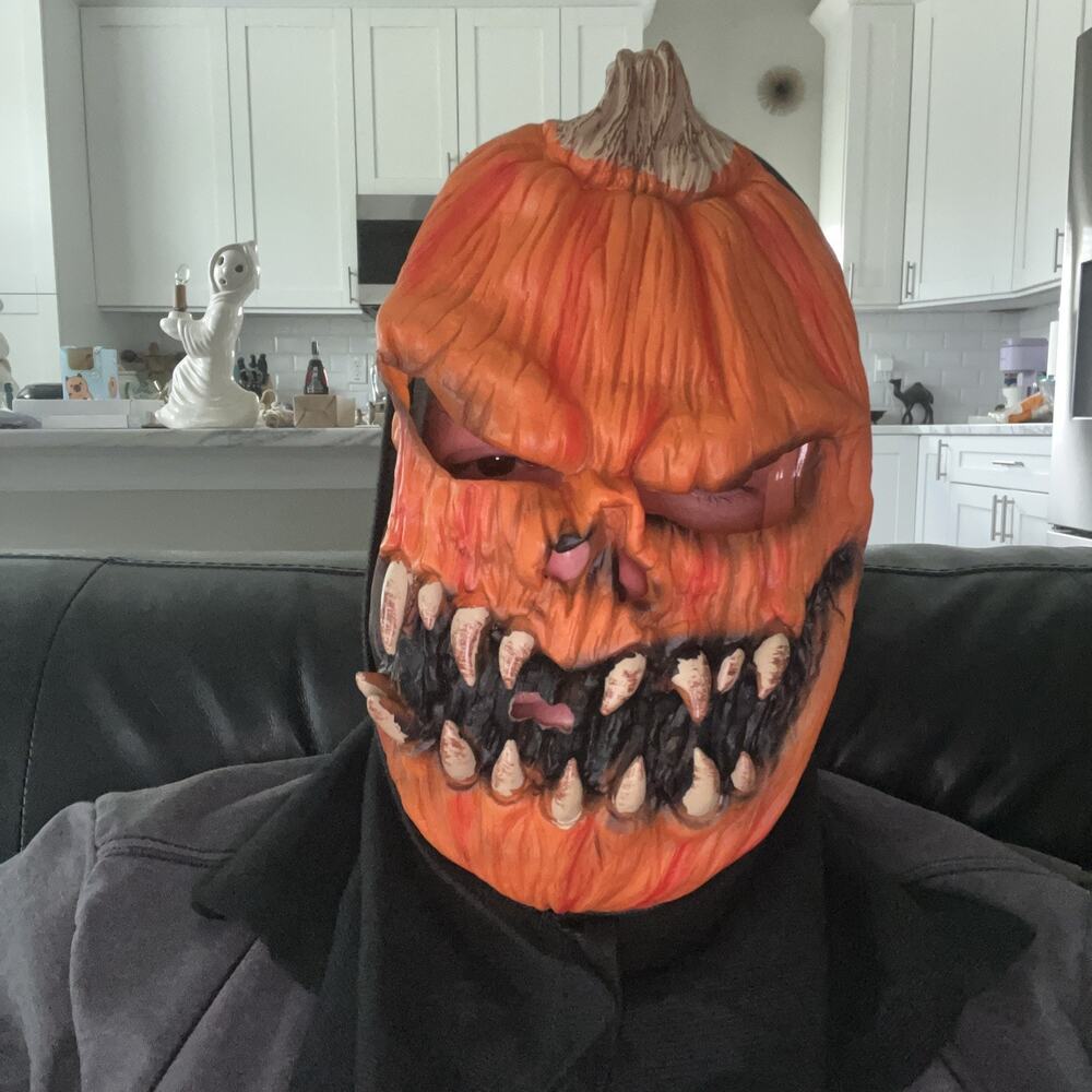Scary Orange Jack-o’-lantern Halloween Mask With A Black Faberic Hoodie